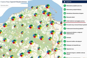 fragment krajowej mapy zagrożeń bezpieczeństwa z zaznaczonymi obszarami i wskazaniem ilości zgłoszeń. Po prawej stronie rozwinięta legenda z kategoriami zagrożeń. Czerwoną kreską jest podkreślona kategoria &quot;osoba bezdomna wymagająca pomocy&quot;