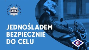 policjant na motocyklu. Napis &quot;jednośladem bezpiecznie do celu&quot;