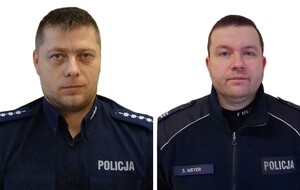 zdjęcie przedstawiające dwóch dzielnicowych na białym tle